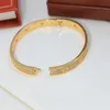 Ontwerper Nieuwe 18K Dikke Goud Goud smalle editie Volledige Diamond Sky Sky Star -paar heren en damesarmbanden met twee rijen Kyrp