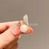 Broche queue de poisson en perles et strass pour femmes, style Baroque, tendance et élégante, cadeaux de fête de mariage, accessoires pour manteau, nouvelle collection