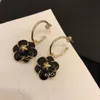 Boucles d'oreilles de mode chaude boucles d'oreilles de luxe de style fleur de camélia pour femmes dame filles boucles d'oreilles en or boucles d'oreilles de mariage avec logo ne se fanent jamais