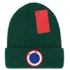 Bonnet / Crâne Casquettes Designer Élégant Crâne D'oie Casquette Lettre Jacquard Bonnet Hommes Femmes Chaud Laine Chapeau Canada Unisexe Ski A2 T1HC111