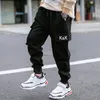 Trousers EACHIN Boys Pants Boy Letter Print Cotton Sweatpants Casual Korean Cargo Pants Fashion Teenage Kids Sport Multi-pocket Pants 231021