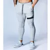 Męskie spodnie męskie bawełniana siłownia bieganie legginsy joggery streetwear swobodny sport spodni granatowy trening męski trening fitness fitness dresspants