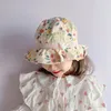 Berretti Cappello da pescatore dolce per bambini Ragazza Protezione UV estiva Cartone animato Neonate Fiocco floreale Cappelli da sole per esterni Berretto con cordino per bambini