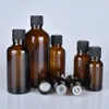 Parfüm şişesi 6pcslot 100ml 50m 30ml 20ml 15ml 10ml 5ml 13oz 1oz kalınlığında Amber İletim Yağı Cam Şişeler Siyah kapaklı kaplar 231021