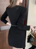 Robes décontractées de base pour femmes Printemps femmes Mini robe élégante classique Sexy noir à manches longues en métal bouton ceinture simple boutonnage mince tenue robes Mujer 2024