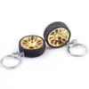 Keychains Alloy Wheel Rim Car Keychain Simulation 3D Däck med bromsskiva gummi Keyring Silikon Auto Nyckel Tillbehör