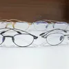 新しいファッション光学デザインメガネ8234透明なメガネを着用するためのファッショナブルでアバンギャルドな快適さを備えた小さな楕円形のフレームクリアレンズアイウェア