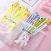 Stylos à bille 10pcs / set mignon gel stylo kawaii motif aléatoire licorne 0.5m encre noire école papeterie bureau fournisseurs cadeaux 231023