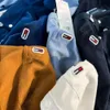 Tommyhilfiger Designer La veste est élégante et de haute qualité Chemise à manches longues en velours côtelé pour hommes avec petite étiquette brodée sur la poitrine en cinq couleurs