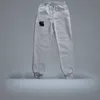 Nowe spodnie dresowe Men039s Hip Hop Streetwear Pants Modne mężczyźni niepokonana chłodna wysokiej jakości spodnie polar