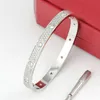 Rostfritt stål full diamant armband design kvinnor män chirstmas bangle armband lyxavstånd smycken gåva ingen låda