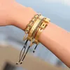 رجال الأساور 4pcs/مجموعة رجال التيتانيوم الصلب الروماني عدد السوار الذهب التاج سحر Macrame Beads banglet braiding