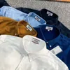 Tommyhilfigerデザイナージャケットジャケットはスタイリッシュで高品質の高級メンズスリムなコーデュロイの長袖シャツと、5色の刺繍された小さな胸ラベルが付いています