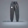 Nowe spodnie dresowe Men039s Hip Hop Streetwear Pants Modne mężczyźni niepokonana chłodna wysokiej jakości spodnie polar