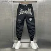 Męskie spodnie y2K litery haftowane szerokopasmowe spodnie męskie koreańskie koreańskie pary swobodne spodni sportowe Całkowicie meczowe mody Spodnie Hot Sale Q231023