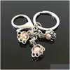 Keychains Lanyards European And American Feather Pearl Cage Key Ring Can Open Hollow Noctilucent Volcanic Stone Pendant Keyring Drop Dhjqp