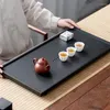 Ensembles de thé service à thé chinois plateau en pierre d'or noir ménage Simple Table décontracté faisant rectangulaire
