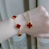 Vanish Pulsera de diseño Van Clef Pulsera de trébol de cuatro hojas de doble cara Red Tiktok caliente Cadena de oro de 18 k Joyería de acero de titanio