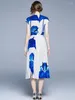 ワークドレストゥルーロリー女性スーツスカート夏の印刷タートルネック半袖ストレッチシャツハイウエストAラインプリーツ2ピースセット