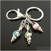 Keychains Lanyards European And American Feather Pearl Cage Key Ring Can Open Hollow Noctilucent Volcanic Stone Pendant Keyring Drop Dhjqp