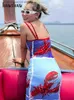 アーバンセクシードレスホーサウの女性メッシュビーコンストリートウェアビーチバケーションロングドレス2023夏の服卸売アイテムビジネスT231023