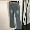 Designer flare jeans för kvinnor brev ficka hög midja denim byxor coola flickor byxor streetwear