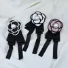 Broches camélia fleur broche perle nœud Badge coréen tissu chemise costume collier épingles pour femmes vêtements accessoires
