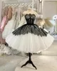 Ballkleid-Abendkleider aus schwarzer Spitze, sexy, trägerlos, für formelle Anlässe, Partykleider für Frauen, Puff-Tüllrock, Tee-Länge, Abschlussballkleid für den zweiten Empfang, CL2801