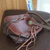 Bolsas de noche Bolsa de cubo de cuero genuino vintage para mujeres Diseñador retro Cesta de cadena Bolso de damas Botón casual Hombro Crossbody