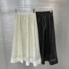 スカート2023秋の冬の長い高品質スエードレザー女性弾性ウエストホローアウトパターンカジュアルマキシ