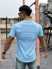 Magliette da uomo Uomo 2023 Palestre estive Casual Allentato Fitness Bodybuilding Colore puro Moda Abbigliamento maschile Tee Tops