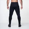 Męskie spodnie męskie hurtowo-2023 siłownia męskie joggery swobodne fitness dres pantalon homme spodnie sportowe odzież kulturystyka