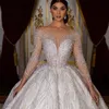 Middle East Dubai Arabic Ball Gown Wedding Dresses Glitter Sequined Sheer Neck Long Sleeves Bridal Gowns Sexy Backless Chapel Train Shiny Vestidos De Novia CL2803