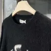 Knitwear hoodie kvinnor mohair tröja helgen designer tröja rund hals tröja kvinnans tröja skjorta överdimensionerad kappa