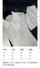 Damen-Strick-T-Shirts, Designer, 2023, neuer französischer leichter, reifer Stil, Promi-Polokragen, Rich Family Thousand Gold, weißer Strick, 33 x 3 cm