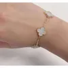 Vanish Pulsera de diseño Van Clef Pulsera de trébol de cuatro hojas de doble cara Red Tiktok caliente Cadena de oro de 18 k Joyería de acero de titanio