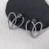 Orecchini a bottone Clip per orecchie a forma di cuore d'amore di lusso per donne Temperamento A forma di cuore BlingBling Gioielli per feste da donna Regalo di Natale di compleanno