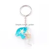 Keychains Lanyards Wholesale Unique 7 Colors Creative Fashion Amber Luminous Dolphin Key Chain Real Starfish Specimen Car Ys2K002 Dr Dh82U