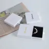 Caixas de jóias 50 pcs personalizado cartão jóias anel colar caixa de armazenamento de presente slide gaveta pacote de papel caixa branca caixa com esponja preta 231023