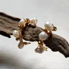 Dingle örhängen fuwo handgjorda kvinnors sötvatten pärla örhänge vackra gyllene pärlor lindade olivgren smycken för kvinnor (ER535)