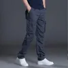 Pantaloni da lavoro multitasche autunno e inverno Pantaloni casual dritti larghi da uomo Pantaloni lunghi durevoli in vita elastica di puro cotone