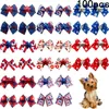 Vêtements de chien 50/100pcs arcs de cheveux d'animaux de compagnie faits à la main 4ème accessoires de juillet bandes de caoutchouc fournitures de toilettage