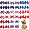 Vêtements de chien 50/100pcs arcs de cheveux d'animaux de compagnie faits à la main 4ème accessoires de juillet bandes de caoutchouc fournitures de toilettage