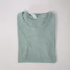 Tシャツ技術デザイナースウェットシャツレディーススポーツ女性Tシャツファッションティーショートトップ衣類湿気を吸うニットハイエラスティックフィットネスランニングワークアウトヨガトップ
