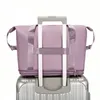 Duffel Bags Kvinnors vattentäta resväska med hjul Portable Bagage Pack Expanderbar stor kapacitet Mäns kortdistans affärsresa