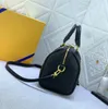 Explosion Borse a cuscino da donna Borsa con rivetti alla moda Borsa tote nera Motivo unico Borchie dorate Rock Roll Speedy Classico da viaggio Top in pelle Lucchetto con cerniera