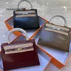 Women Box Leather Handbag 2023 Spring Top Layer Cowhide Bag andra generationens mini Bag Box Cowhide Bag Portable One-Shulder Cross-Body Women's Bag L L