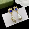 Designer de luxe Mode Charme Boucles d'oreilles Femmes Rouge Bleu Pierre précieuse Cristal Blanc Résine Pendentif Boucles d'oreilles pour les femmes de mariage cadeau de Noël bijoux