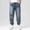 Calças de brim dos homens plus size m8xl moda homens calças de carga multpockets tático jean streetwear hip hop casual masculino denim calças 231024