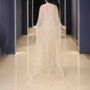 Sexiga pärlor Luxur Designer Prom Dresses 2023 Champagne med Cape sa Arabia Dubai Dress for Women Evening Party Dress